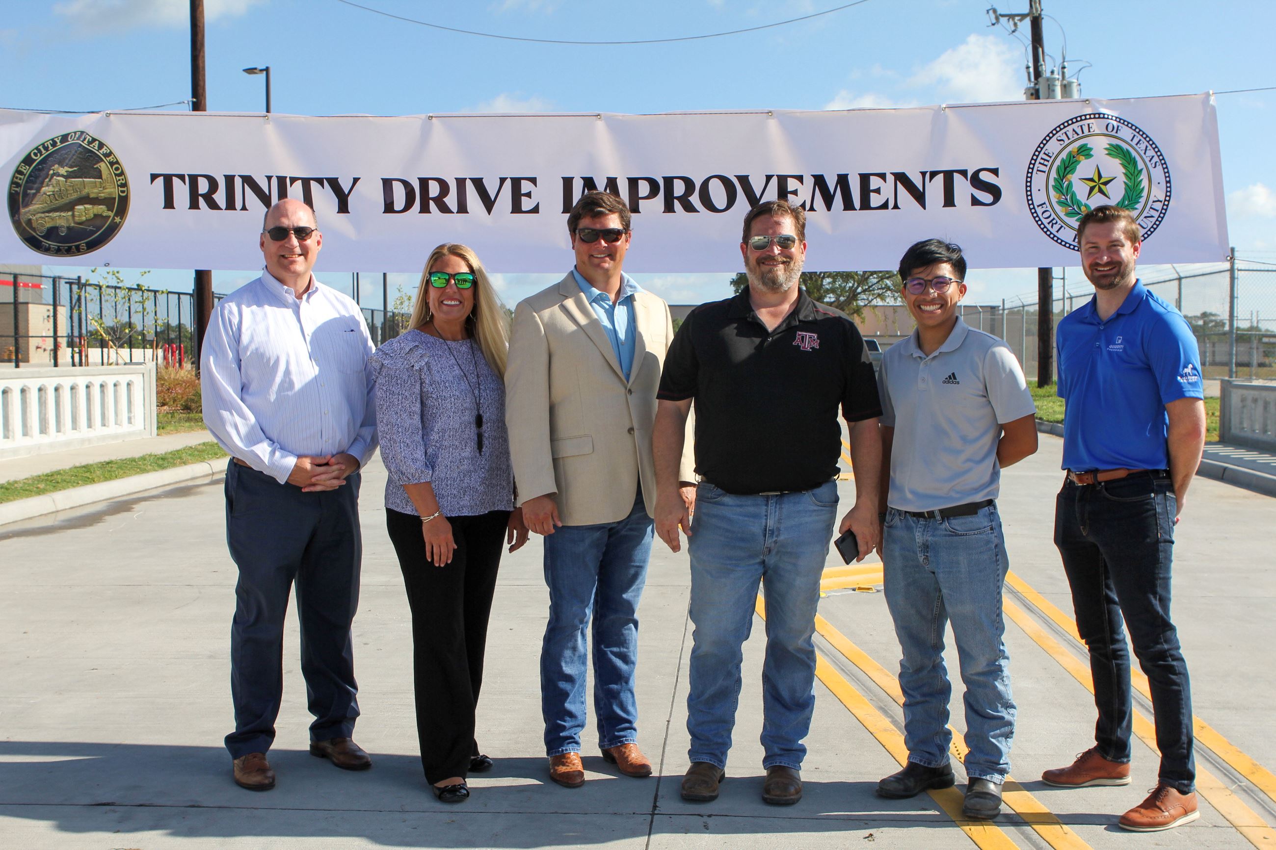 Photo of Engineering Company in front of sign 