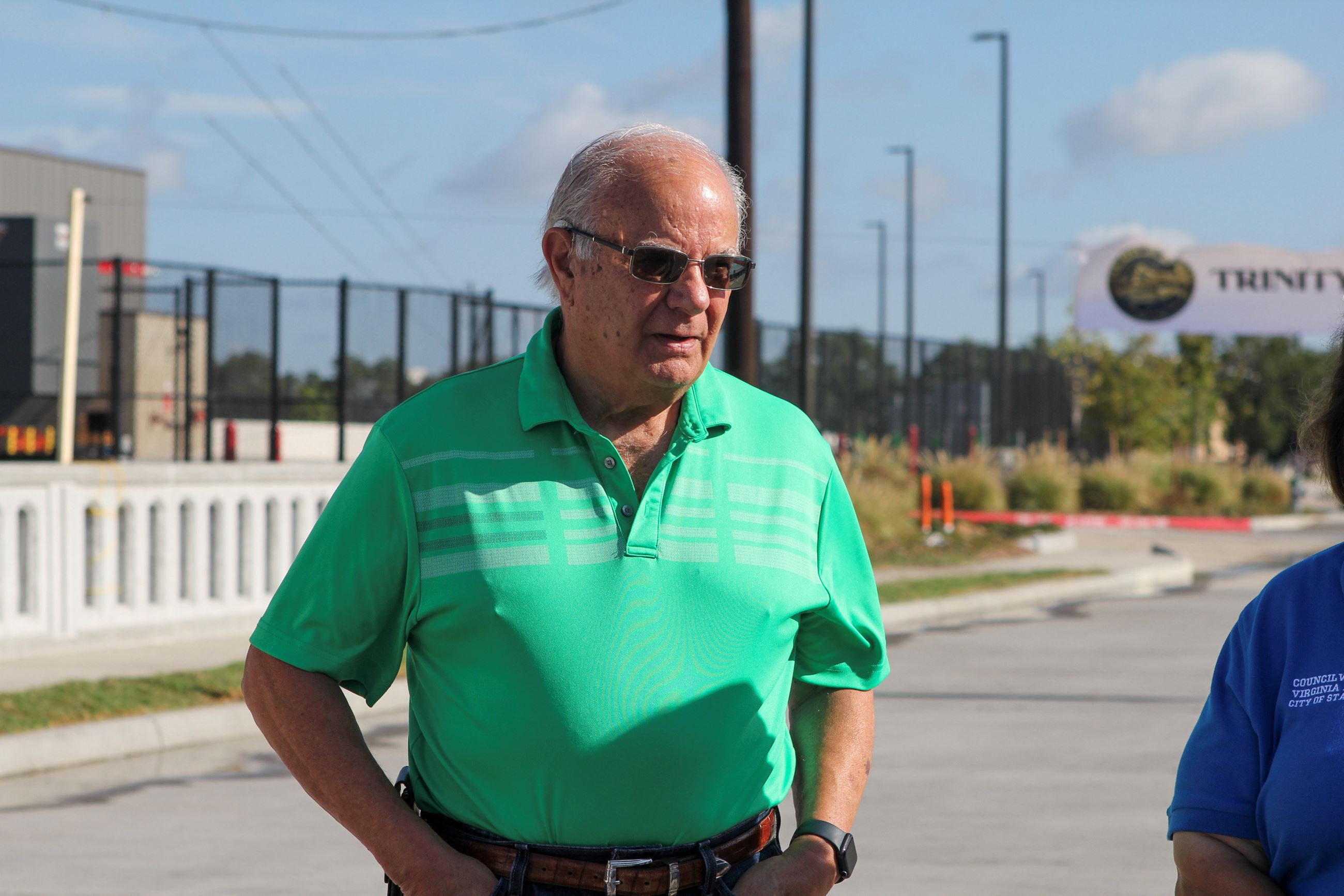 Speeches before the ribbon cutting at Trinity Drive